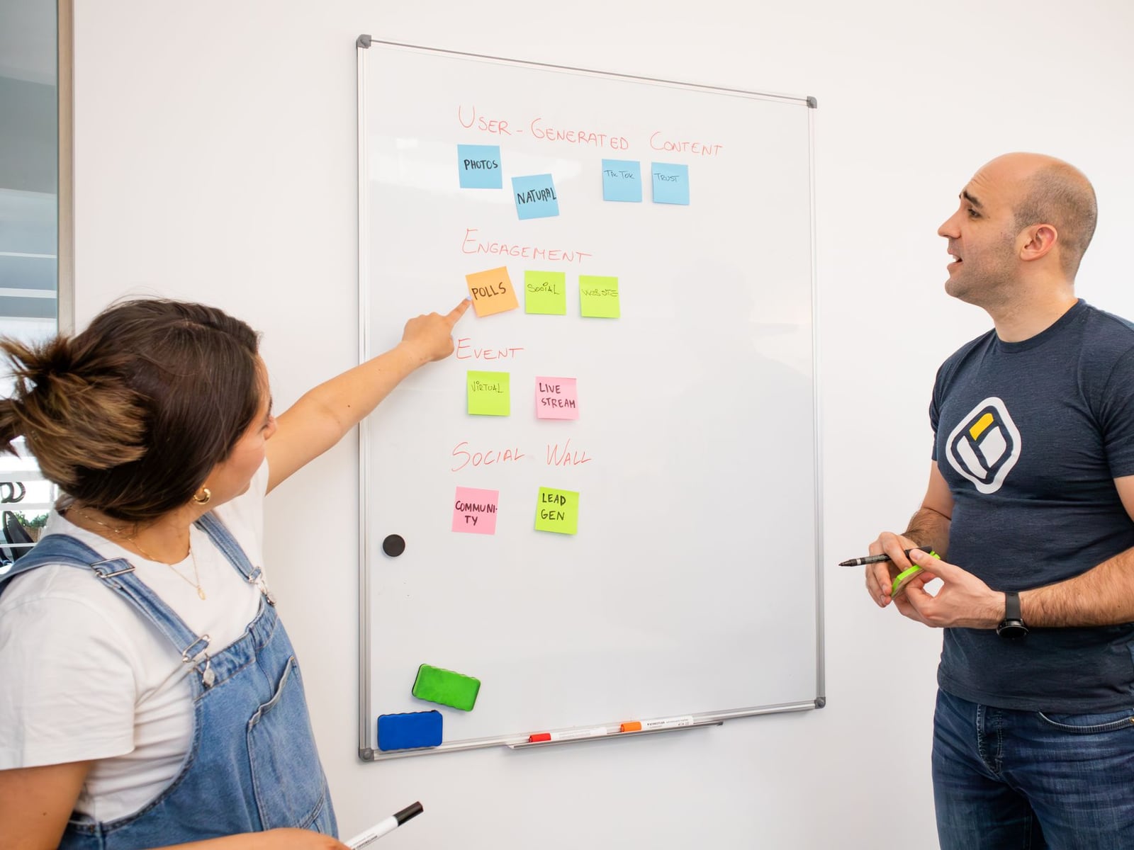 A creative team brainstorming corporate blog topics in a modern Brisbane office