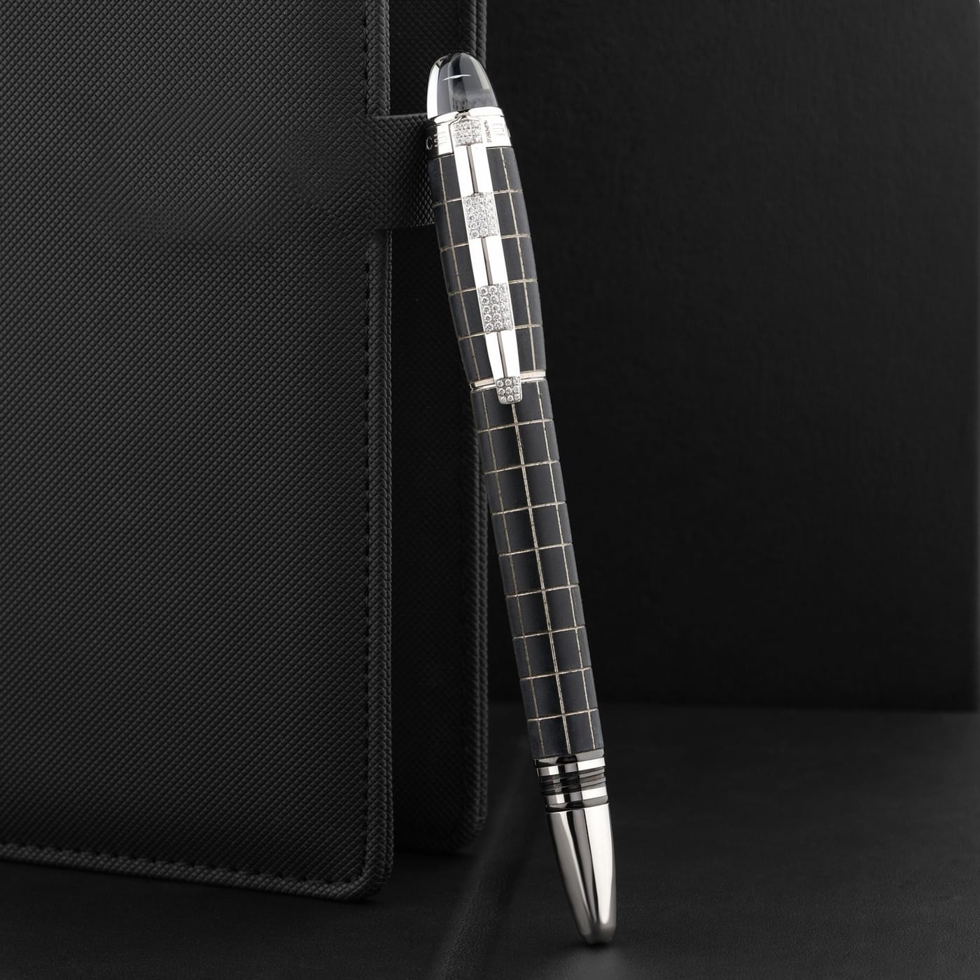 Close-up of a fountain pen nib on premium paper, symbolizing quality writing